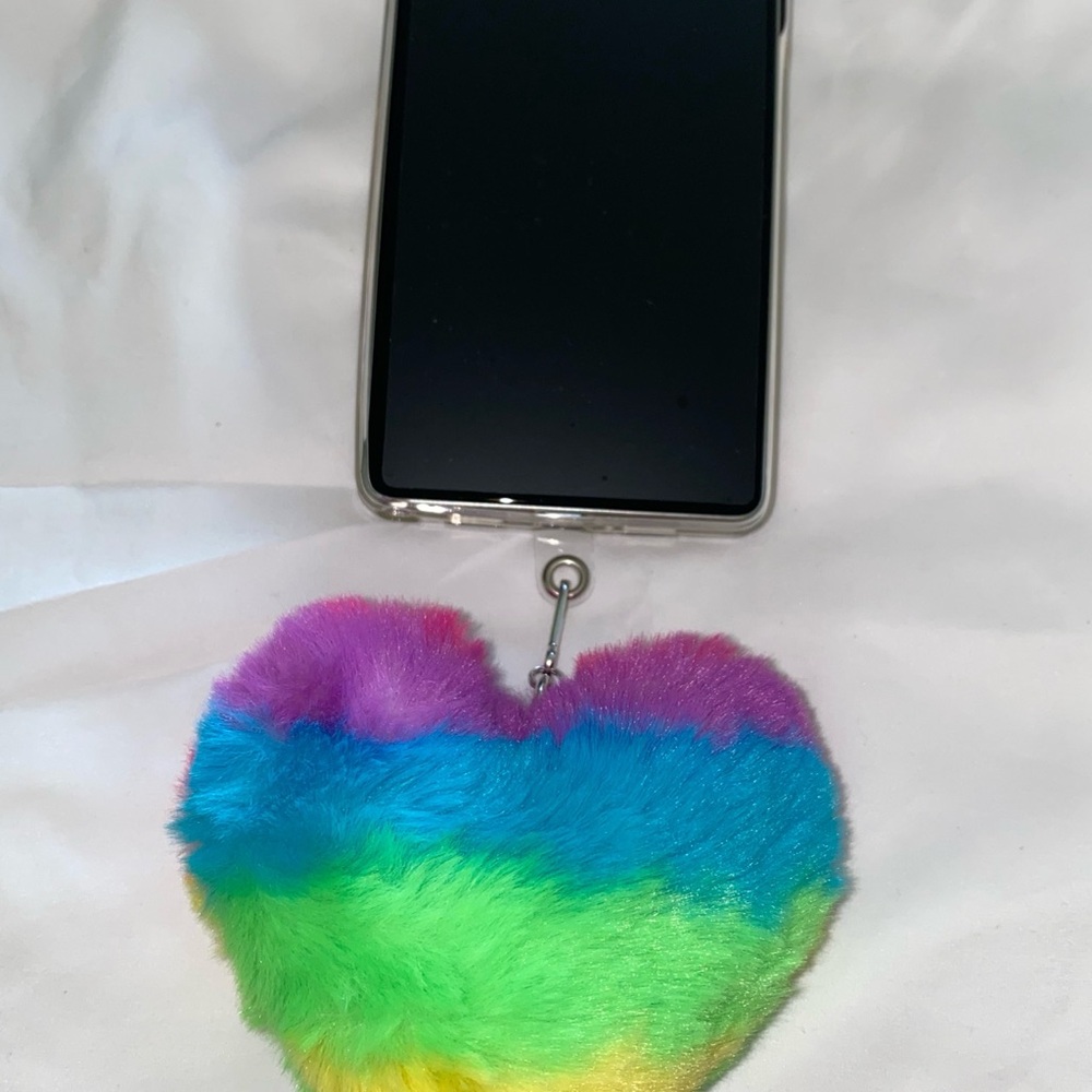 Cell universal case pad hand holder 
3D furry squishable heart RAINBOW design
